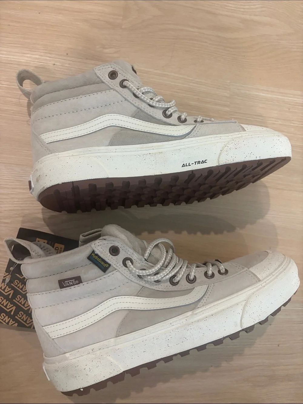 Vans women’s8.5/mens 7 High-Top Suede Sneakers in Light Gray and White